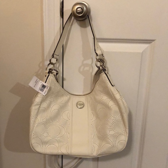 New with tags Coach and Michael Kors purses. - Picture 1 of 6